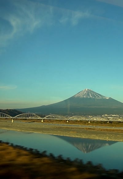 Mount Fuji seen from a moving train